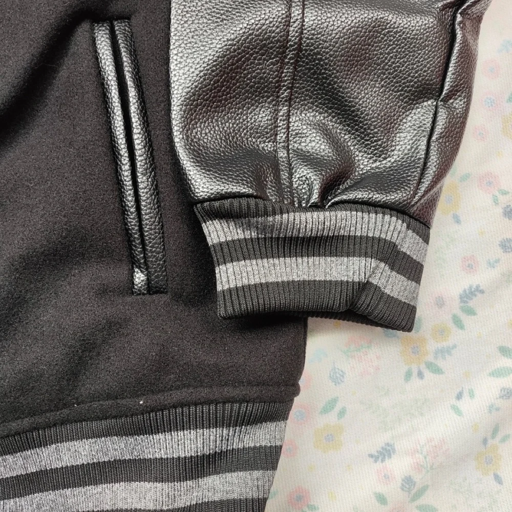 Nike Black Varsity Jacket with Mint Accents